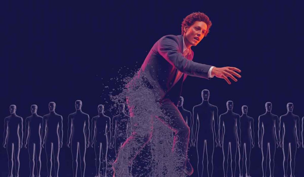 A man in a suit appears to disintegrate into dust while standing in front of a row of stylized, human-like figures on a dark background.